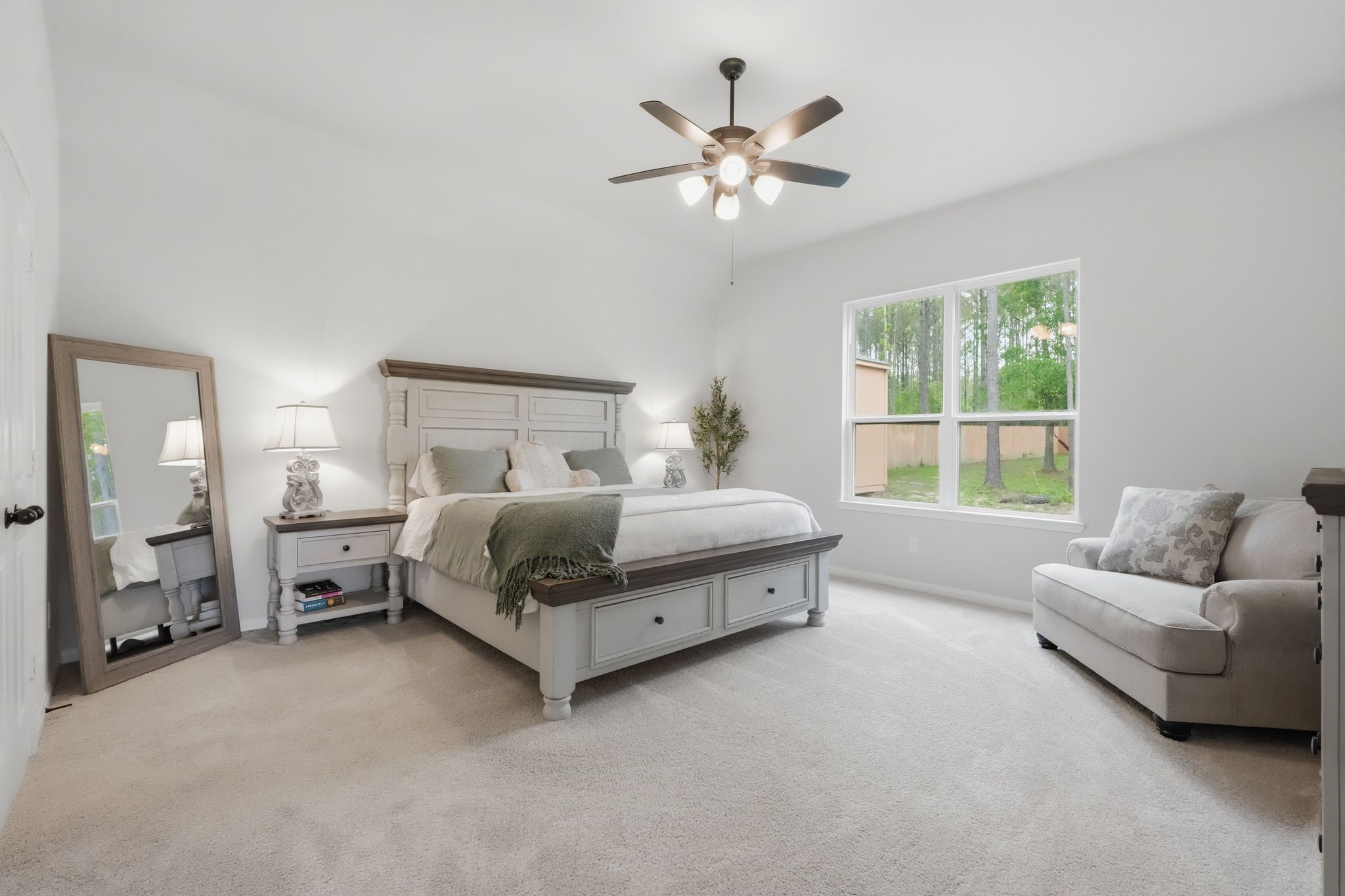 13331 Wichita Fall Trail Road Conroe, TX 77303 - Photo 13 of 22 Private primary suite with direct access to the back patio and plenty of space to truly relax.