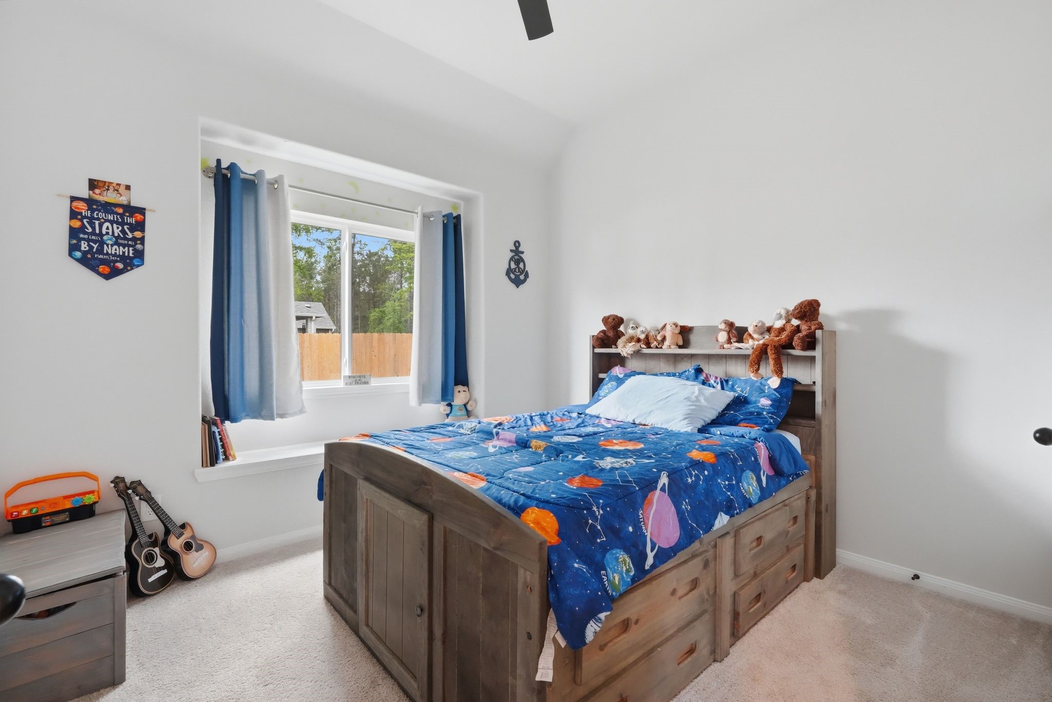 13331 Wichita Fall Trail Road Conroe, TX 77303 - Photo 16 of 22 Bright secondary bedroom with a clean layout and plenty of space.