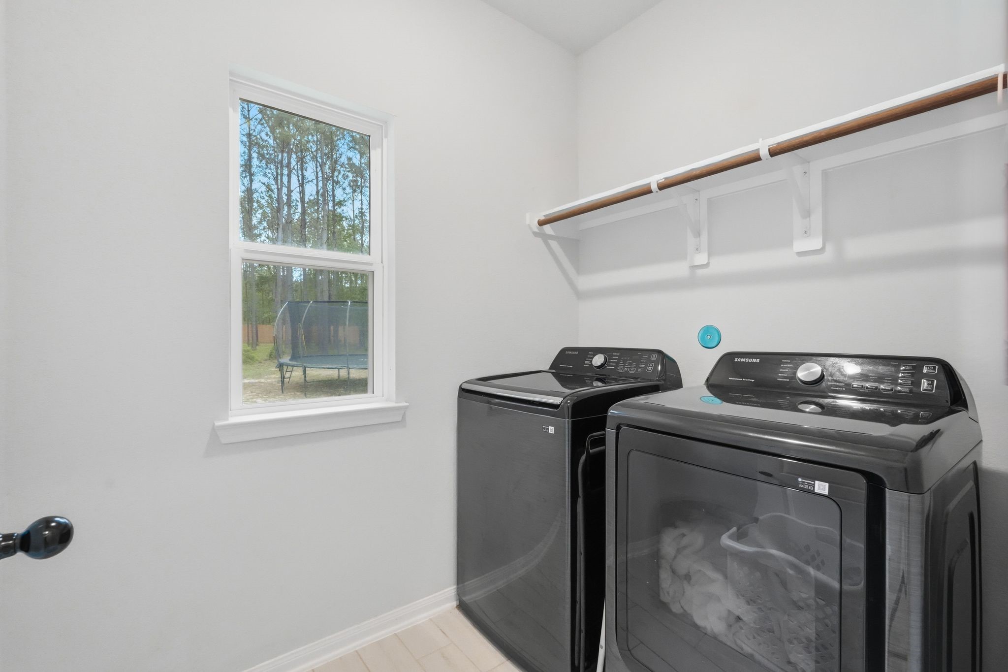13331 Wichita Fall Trail Road Conroe, TX 77303 - Photo 19 of 22 laundry room with a clean, functional setup.