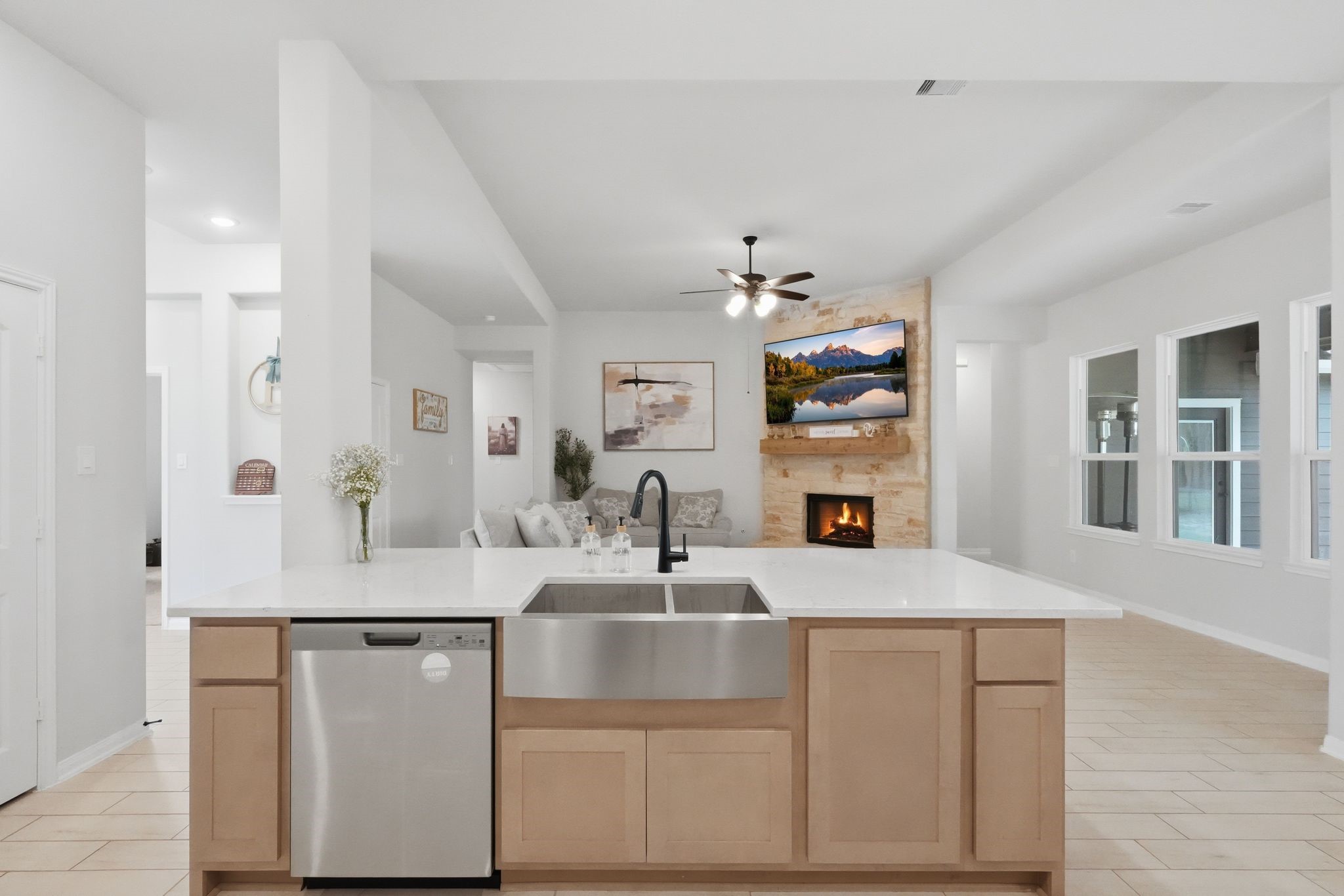 13331 Wichita Fall Trail Road Conroe, TX 77303 - Photo 10 of 22 Open-concept kitchen with a large island overlooking the main living area, perfect for staying connected while cooking.