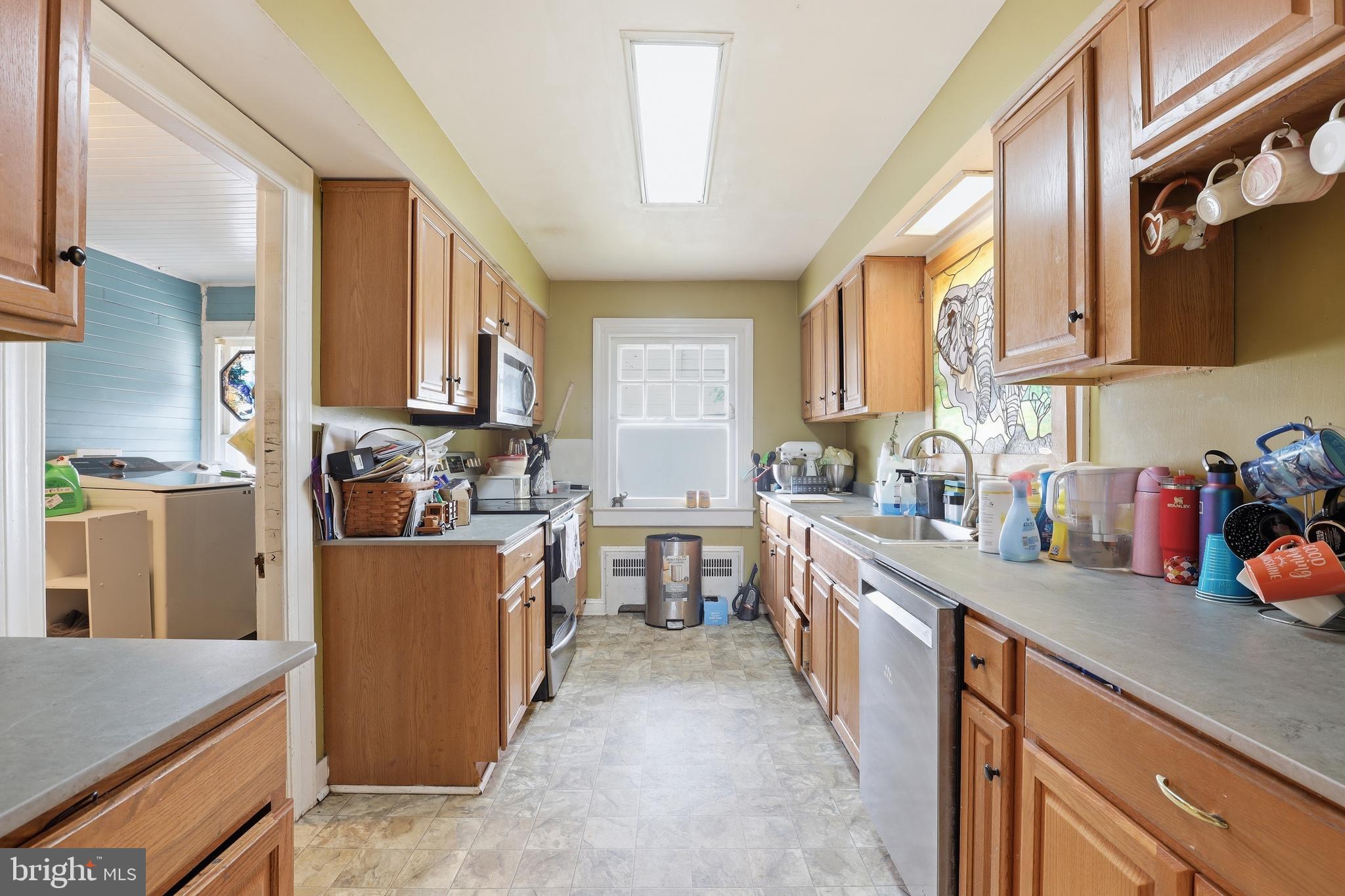 32076 Gordy Road Laurel, DE 19956 - Photo 21 of 52 a kitchen with cabinets and window