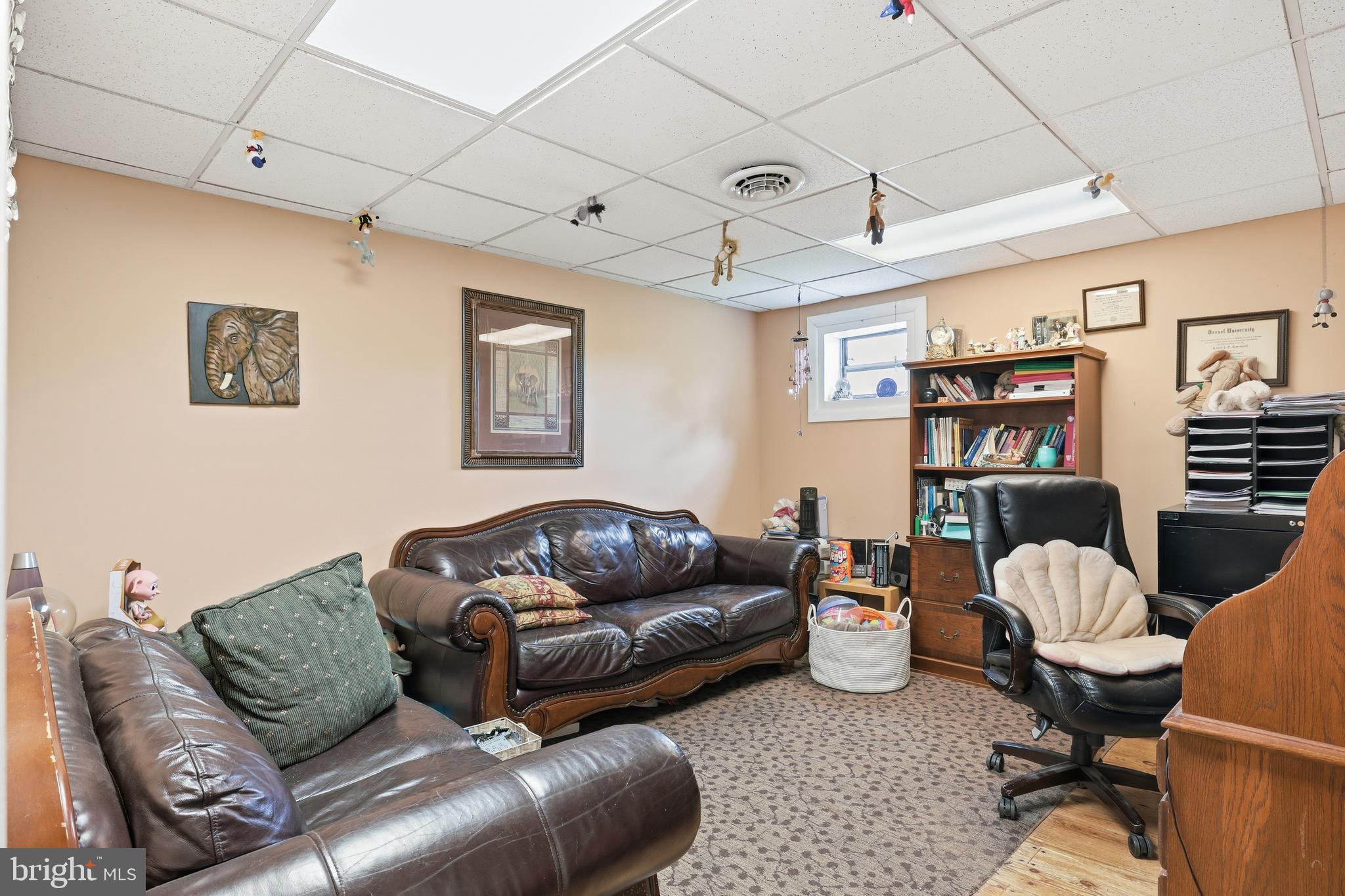 32076 Gordy Road Laurel, DE 19956 - Photo 5 of 52 a living room with furniture a ceiling fan and a rug