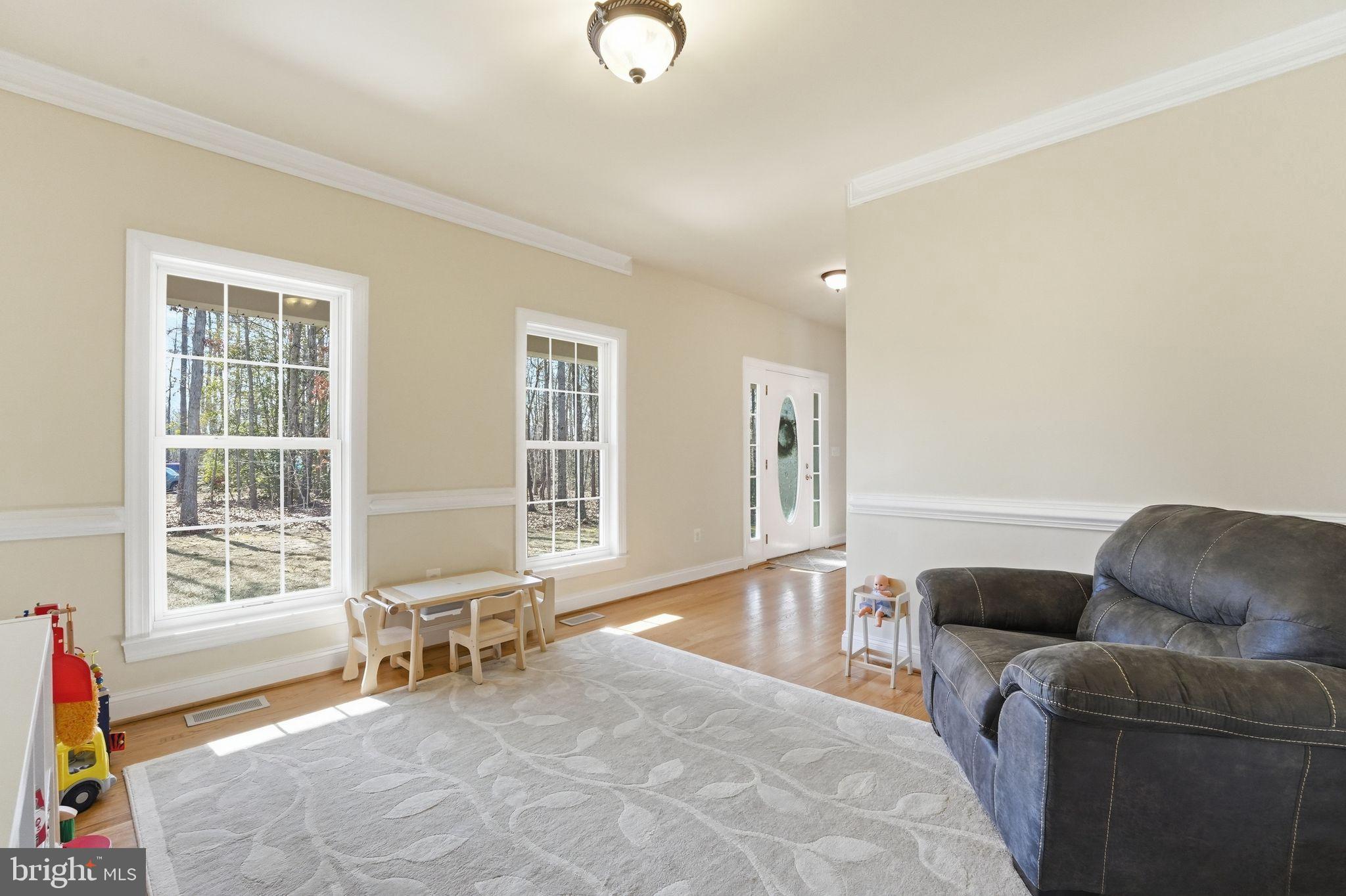 2171 Towles Road Midland, VA 22728 - Photo 13 of 58 a living room with furniture and a window