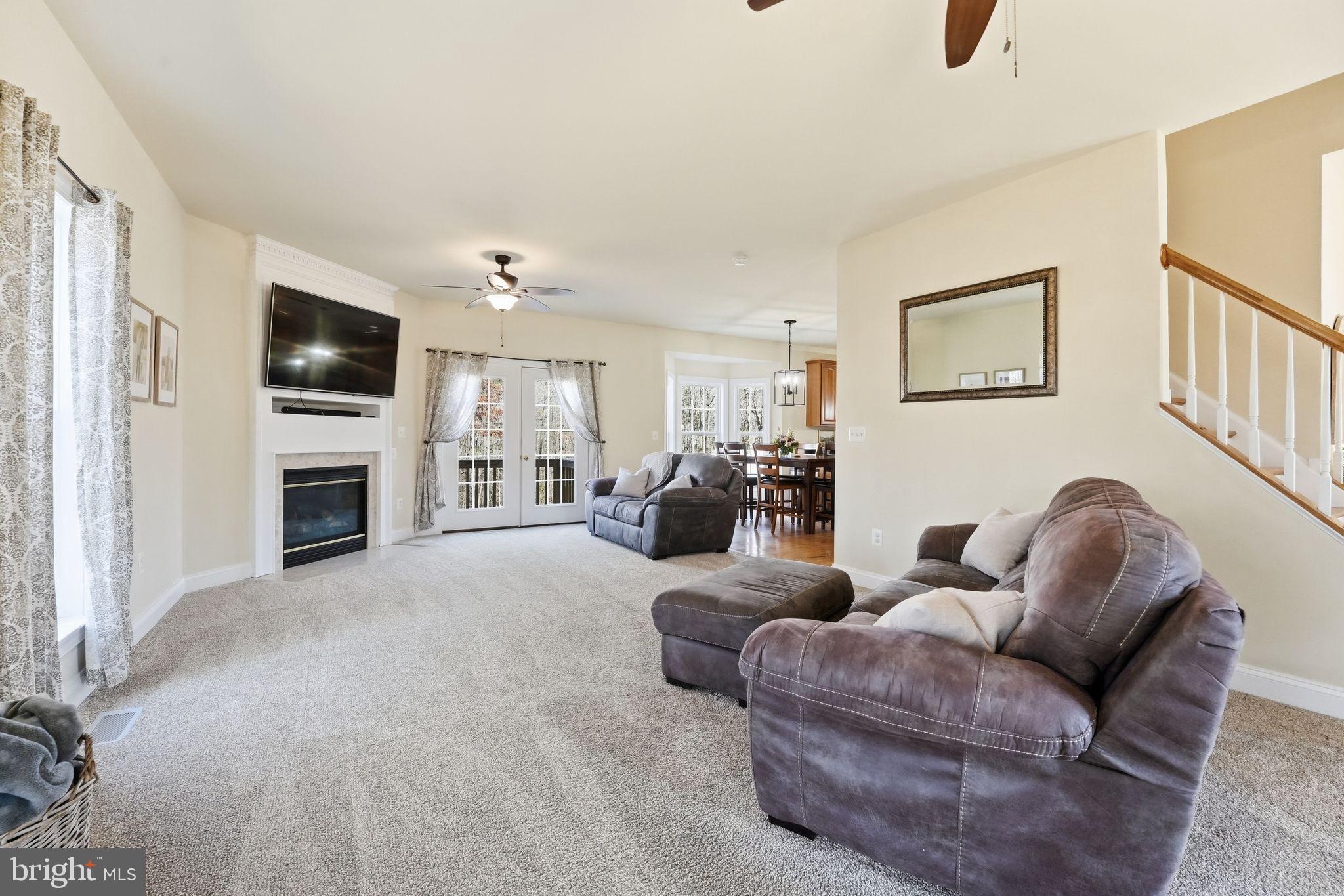 2171 Towles Road Midland, VA 22728 - Photo 14 of 58 a living room with furniture and a flat screen tv