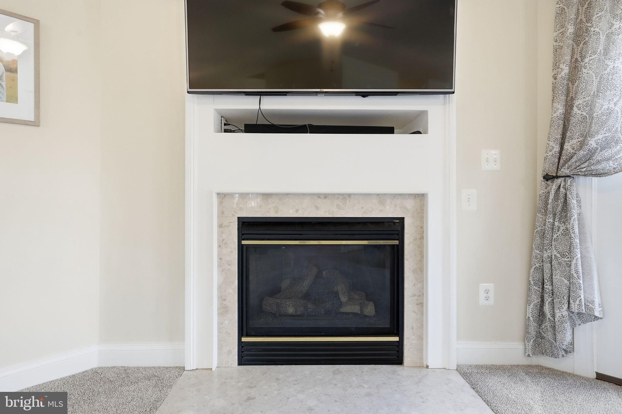2171 Towles Road Midland, VA 22728 - Photo 16 of 58 a living room with a fireplace