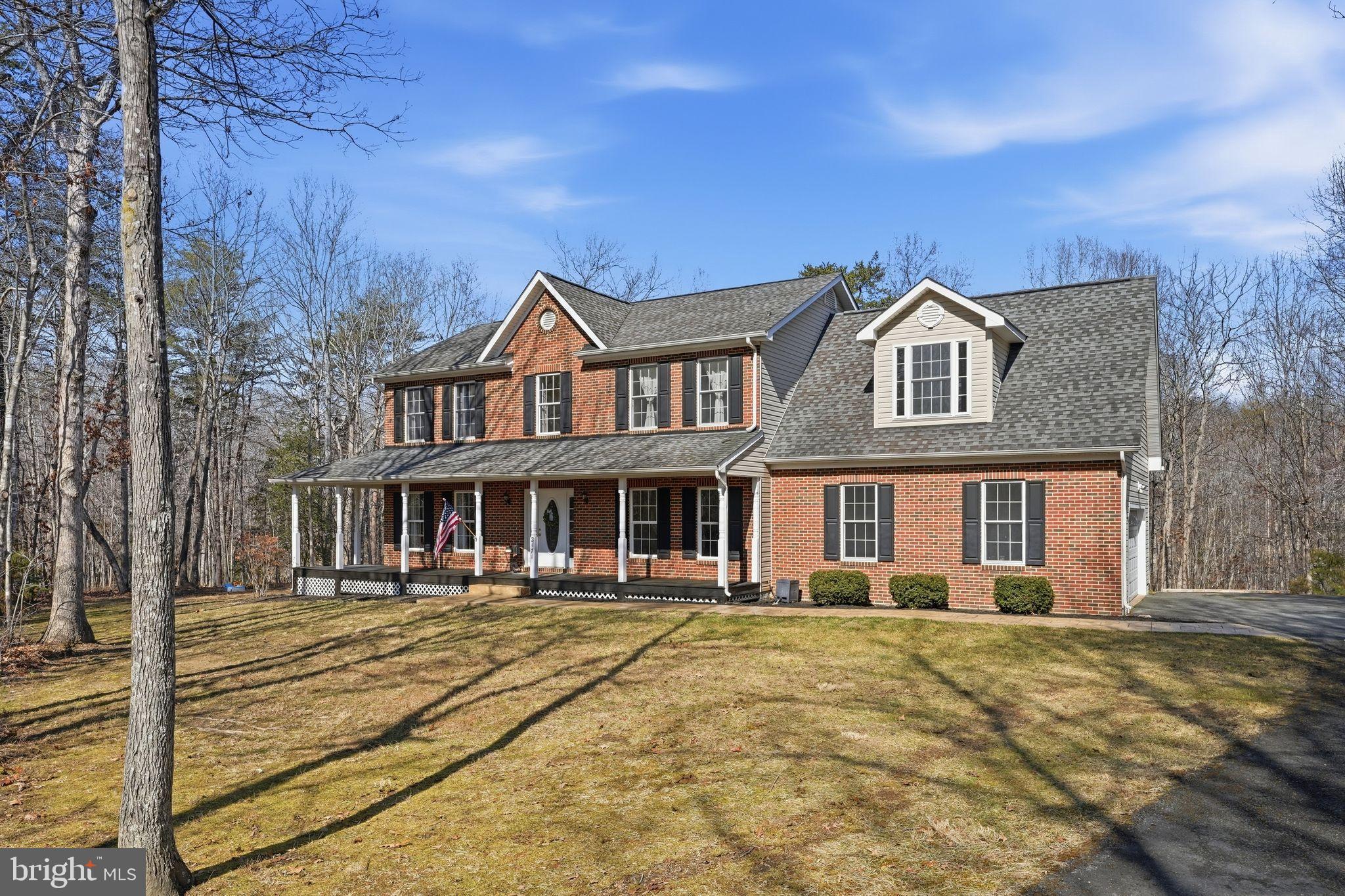 2171 Towles Road Midland, VA 22728 - Photo 2 of 58 a front view of a house with a yard