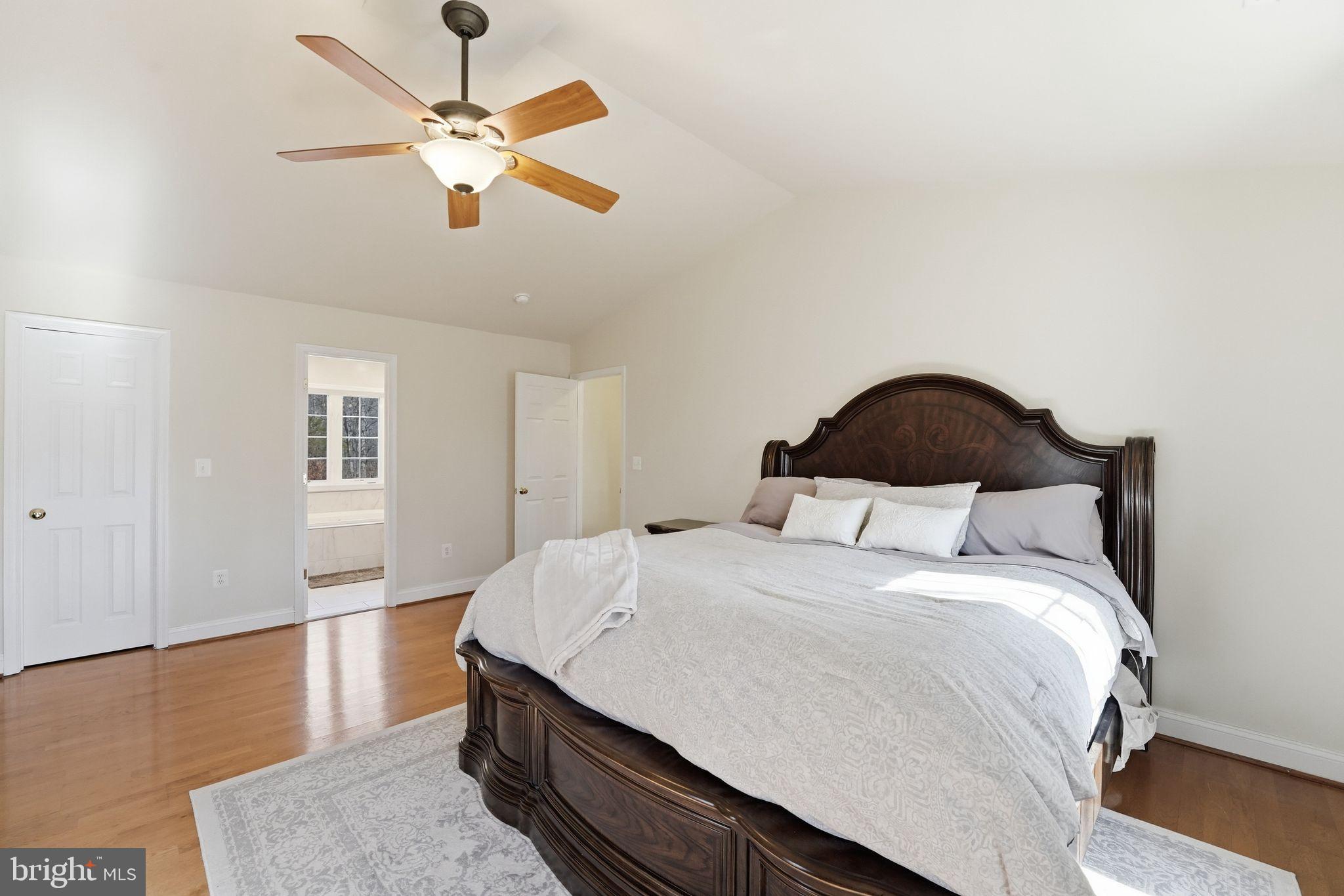 2171 Towles Road Midland, VA 22728 - Photo 29 of 58 a bedroom with a bed and a ceiling fan