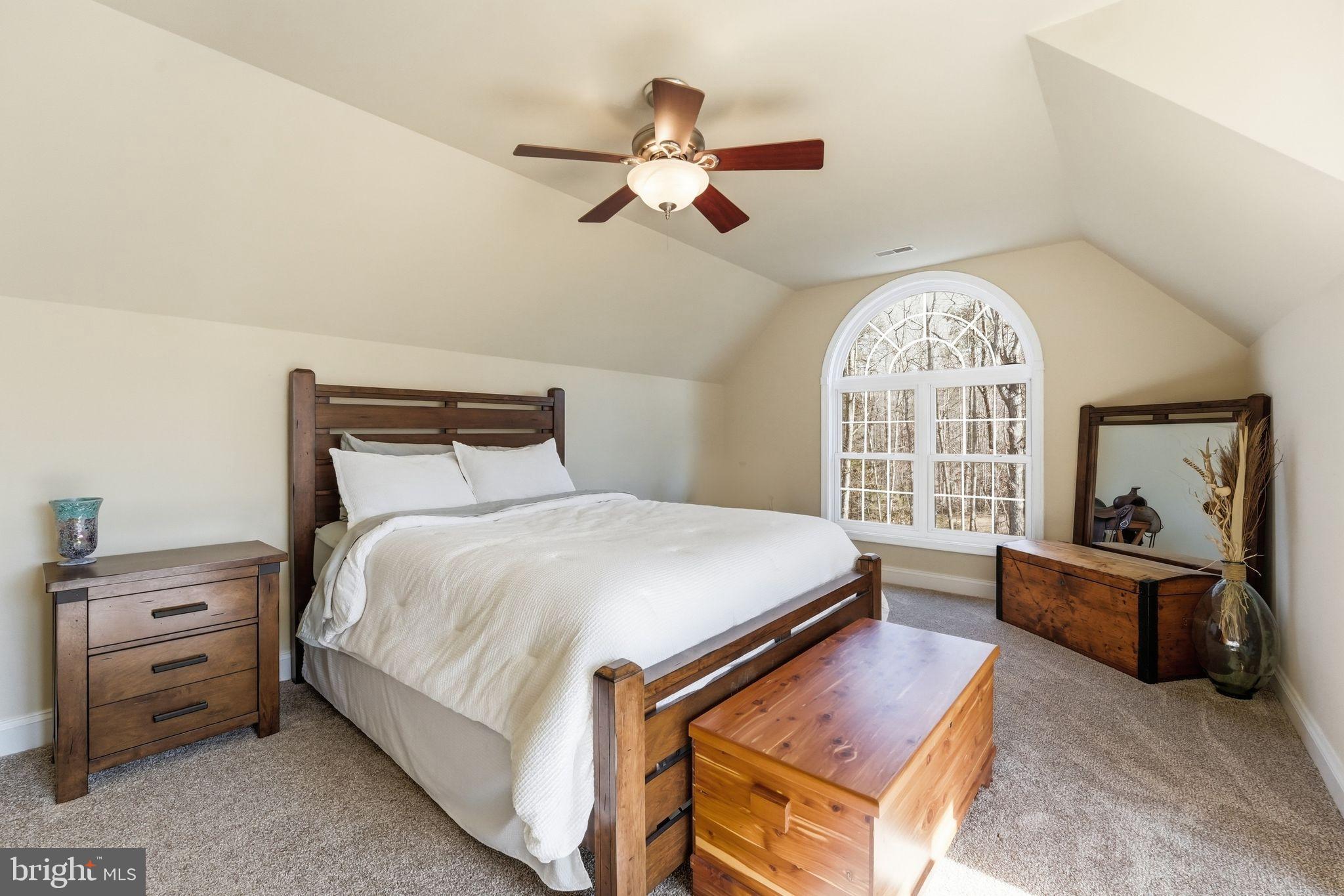 2171 Towles Road Midland, VA 22728 - Photo 43 of 58 a bed room with a bed and a large window