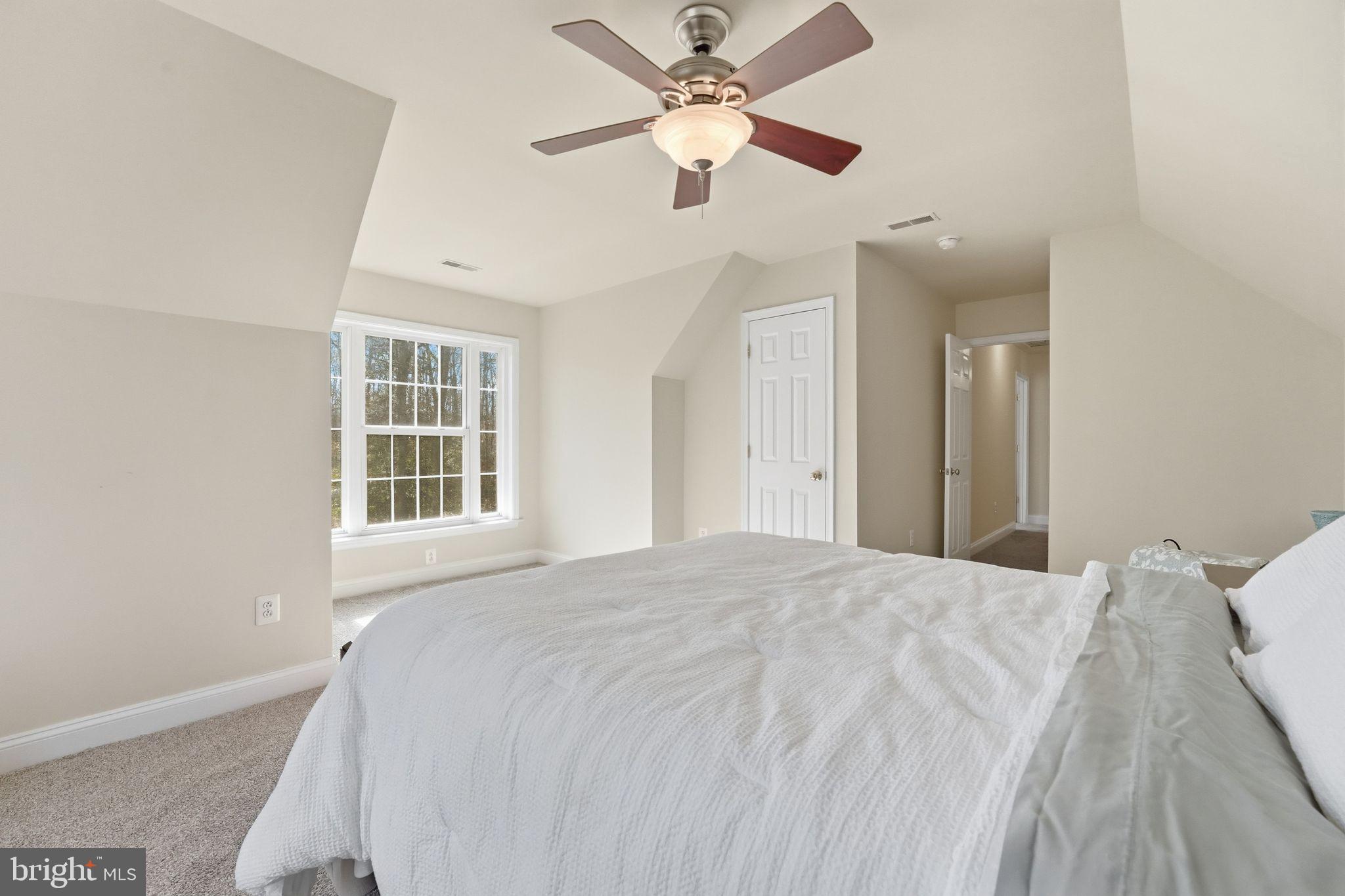 2171 Towles Road Midland, VA 22728 - Photo 44 of 58 a bedroom with a bed and a window