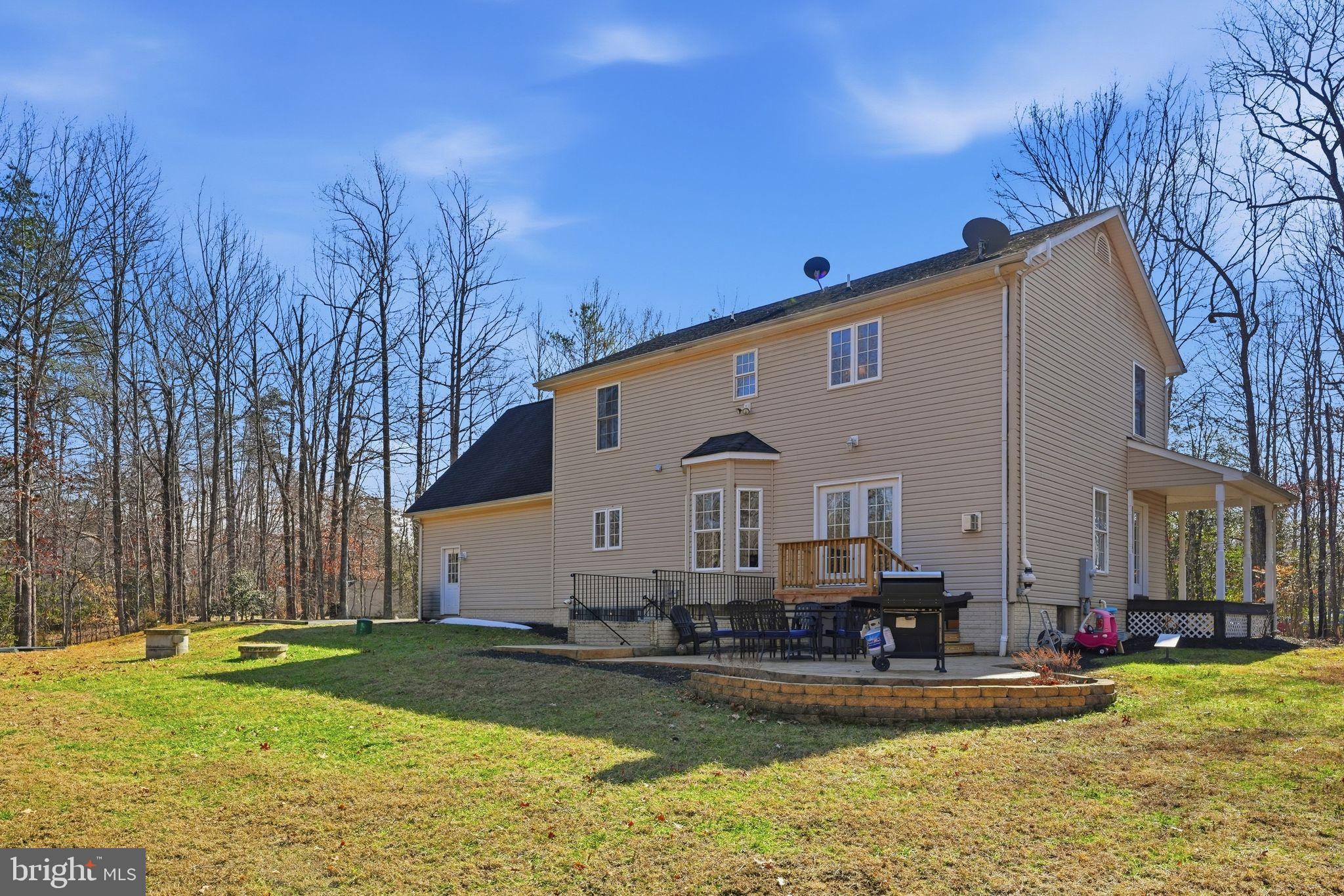 2171 Towles Road Midland, VA 22728 - Photo 50 of 58 a front view of house with swimming pool and green space