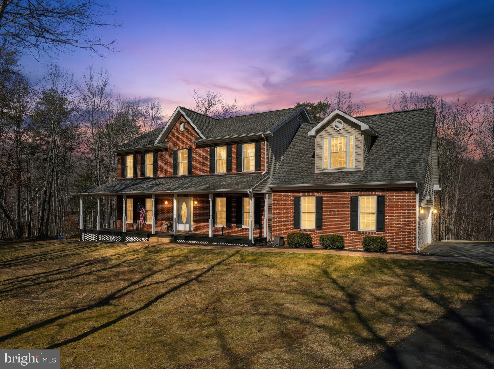 2171 Towles Road Midland, VA 22728 - Photo 54 of 58 a front view of a house with a yard