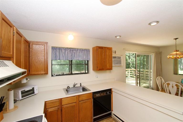 54 Round House Road, Unit 54 Bourne, MA 02532 - Photo 11 of 25 a bathroom with a sink double vanity and a mirror