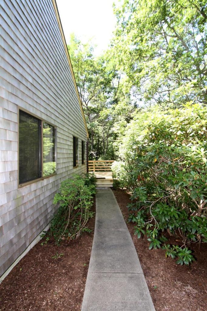 54 Round House Road, Unit 54 Bourne, MA 02532 - Photo 3 of 25 a view of a pathway with a house