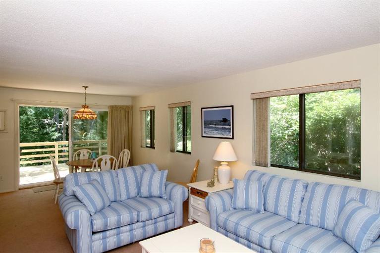 54 Round House Road, Unit 54 Bourne, MA 02532 - Photo 8 of 25 a living room with furniture and a large window