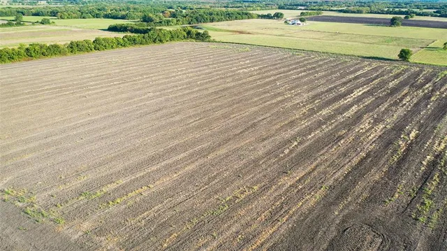 a view of a swimming pool and an outdoor space