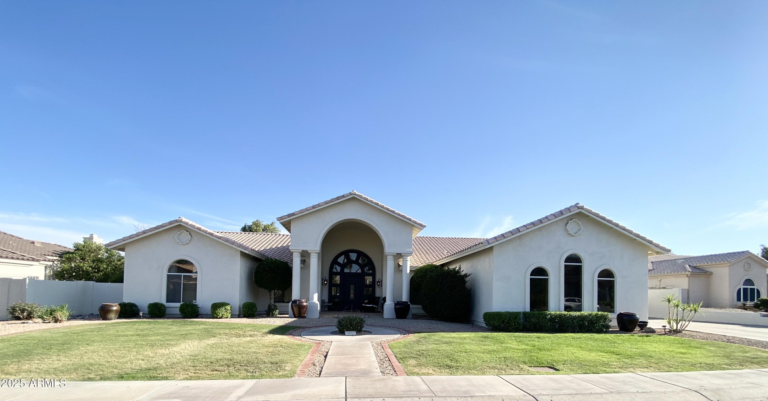 4551 East Cochise Road Phoenix, AZ 85028 - Photo 41 of 43 a view of house with yard and green space