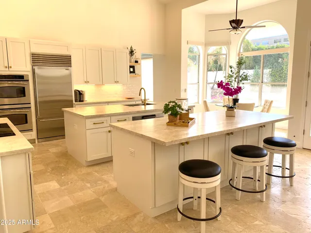 a kitchen with a sink and a stove