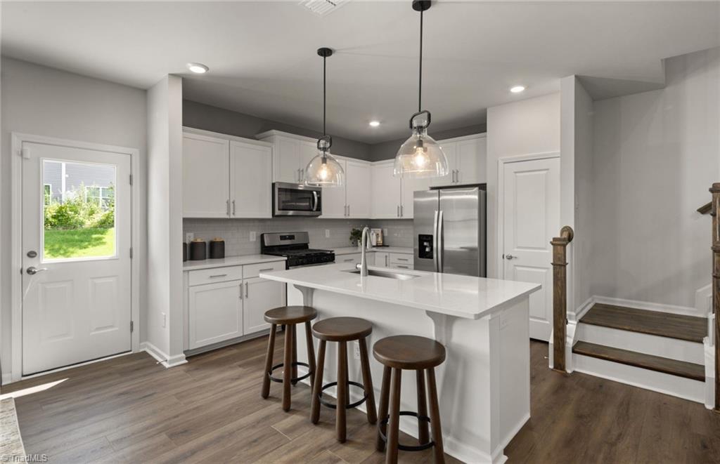 922 Poets Walk Road Whitsett, NC 27377 - Photo 3 of 20 Model Representation. Selections will vary.