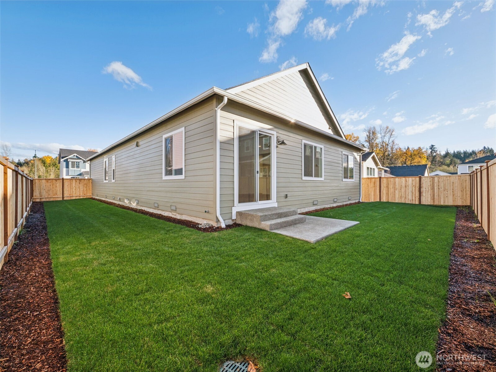 749 South Davis Street, Unit 104 Buckley, WA 98321 - Photo 11 of 11 a view of a house with a backyard