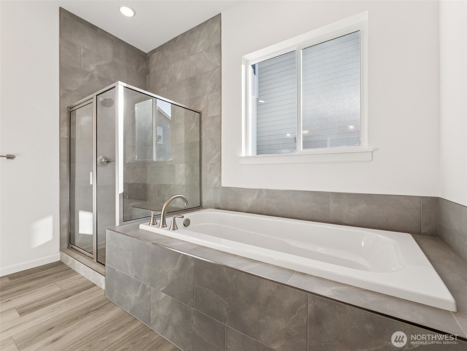 749 South Davis Street, Unit 104 Buckley, WA 98321 - Photo 8 of 11 a bathroom with a bathtub and a sink