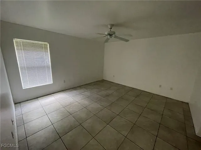 en empty room with windows