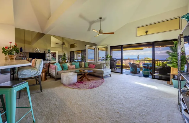 a bedroom with a bed and a mirror