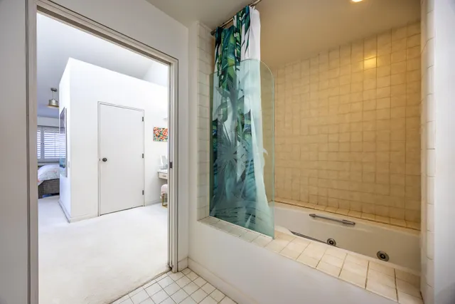 a view of a swimming pool with a deck