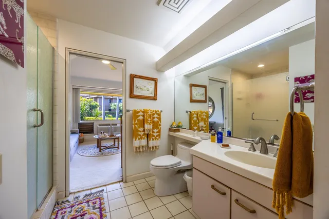 a view of a swimming pool with a patio and a garden