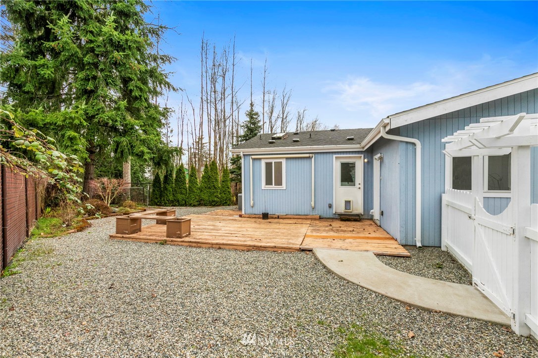 3532 Sylvan Pines Circle Bremerton, WA 98310 - Photo 20 of 22 a front view of a house with a yard