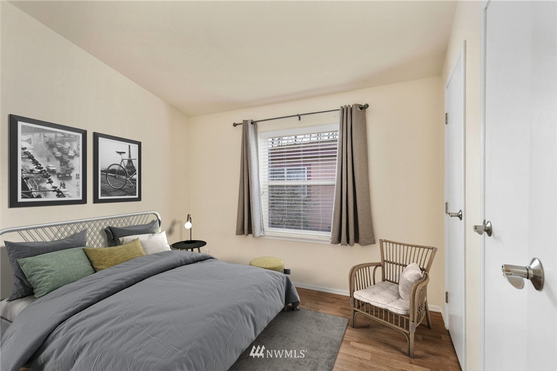 3532 Sylvan Pines Circle Bremerton, WA 98310 - Photo 7 of 22 a bedroom with a bed and a window