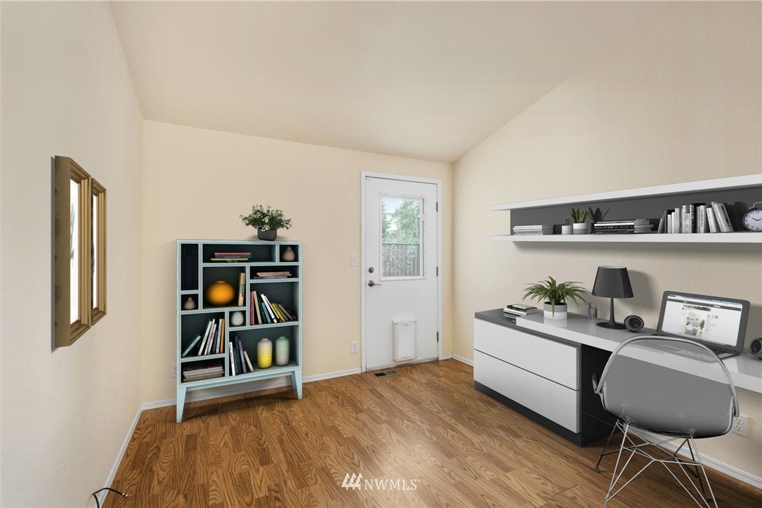 3532 Sylvan Pines Circle Bremerton, WA 98310 - Photo 8 of 22 a room with a bed and a book shelf