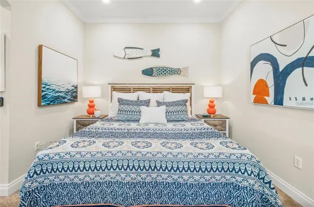 a bedroom with a bed and dresser