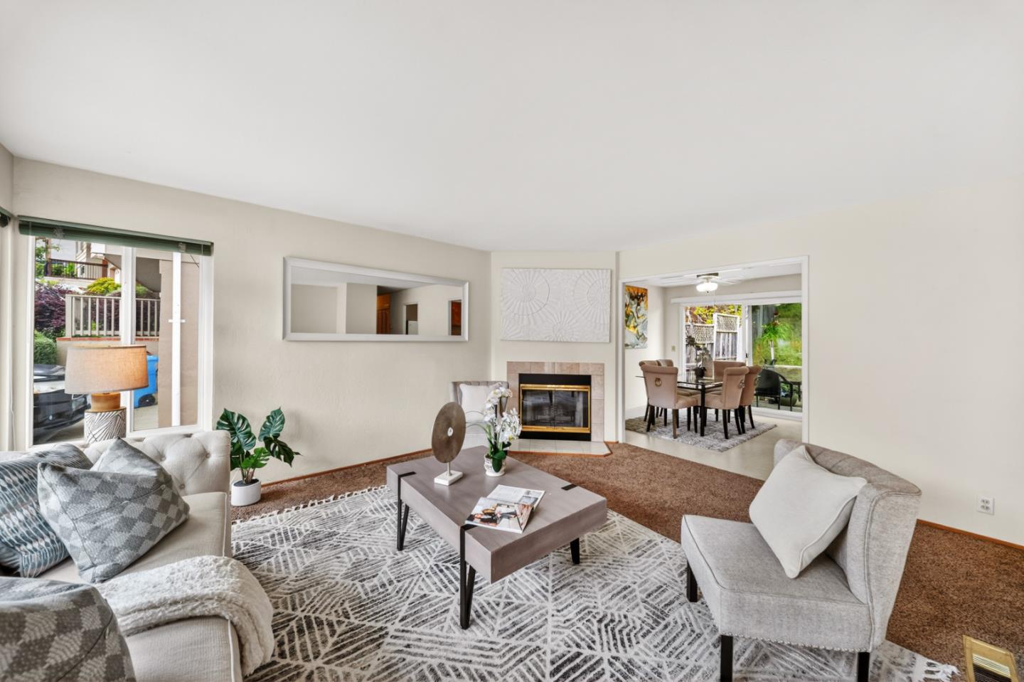 1287 Lerida Way Pacifica, CA 94044 - Photo 22 of 52 a living room with furniture fireplace and a fireplace