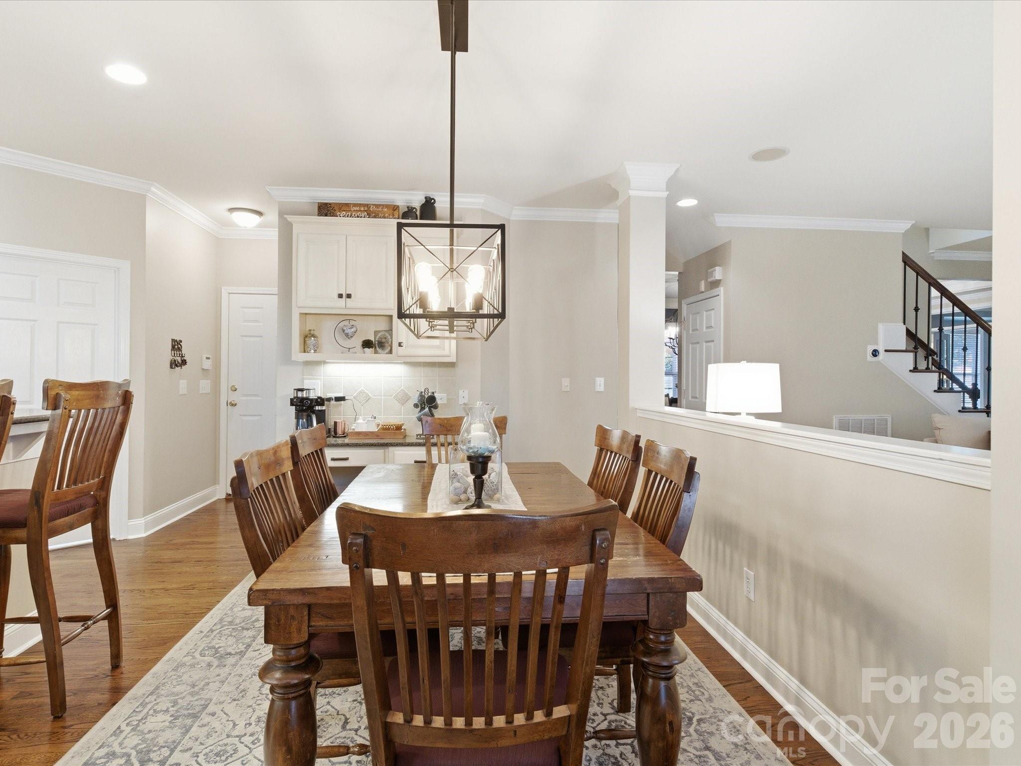6318 Riverside Oaks Drive Huntersville, NC 28078 - Photo 23 of 48 a view of a dining room with furniture