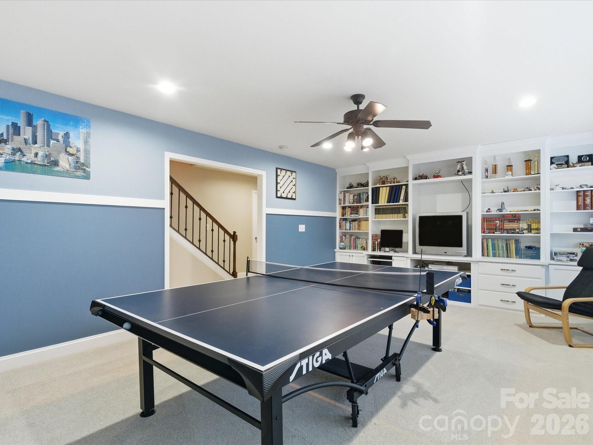 6318 Riverside Oaks Drive Huntersville, NC 28078 - Photo 27 of 48 a workspace with furniture pool table and a window