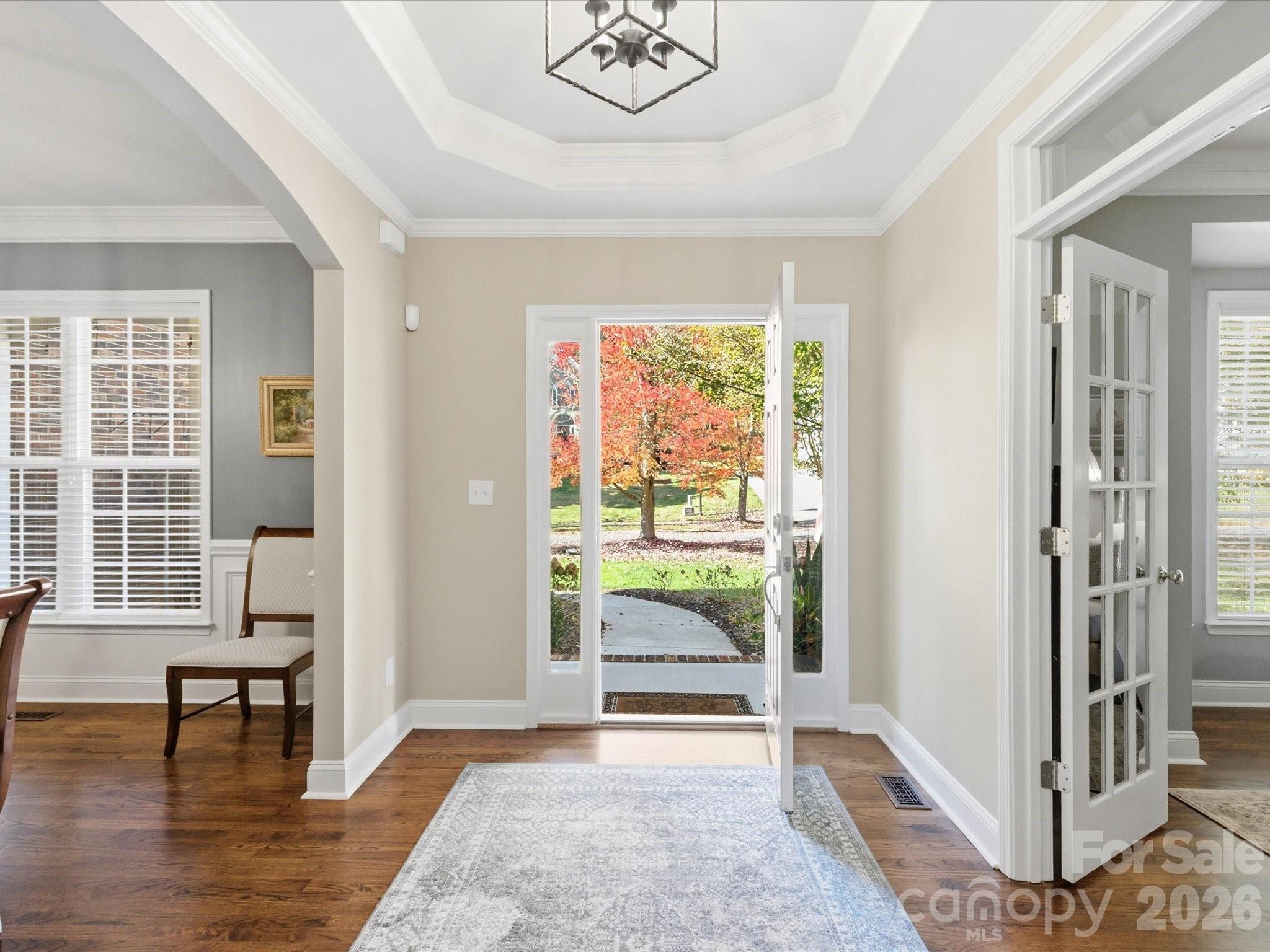 6318 Riverside Oaks Drive Huntersville, NC 28078 - Photo 4 of 48 a view of a livingroom with furniture and a window