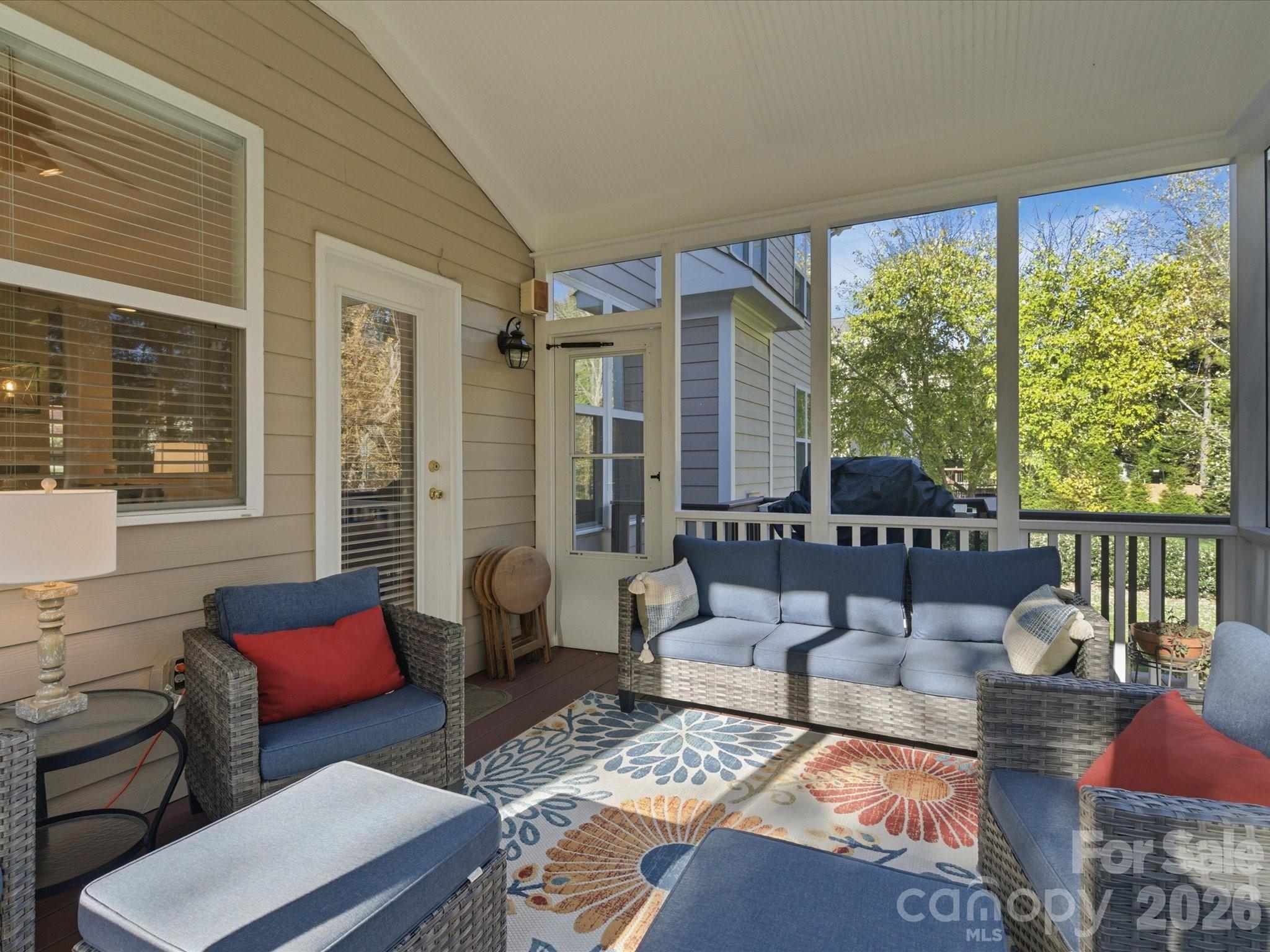 6318 Riverside Oaks Drive Huntersville, NC 28078 - Photo 43 of 48 a living room with furniture and a large window