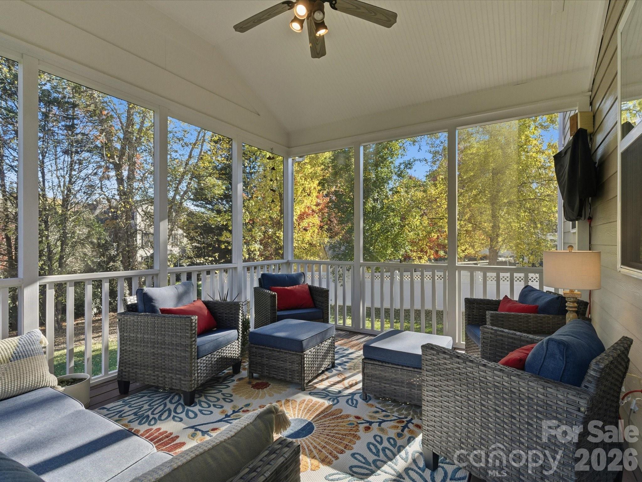 6318 Riverside Oaks Drive Huntersville, NC 28078 - Photo 44 of 48 a living room with furniture and a flat screen tv