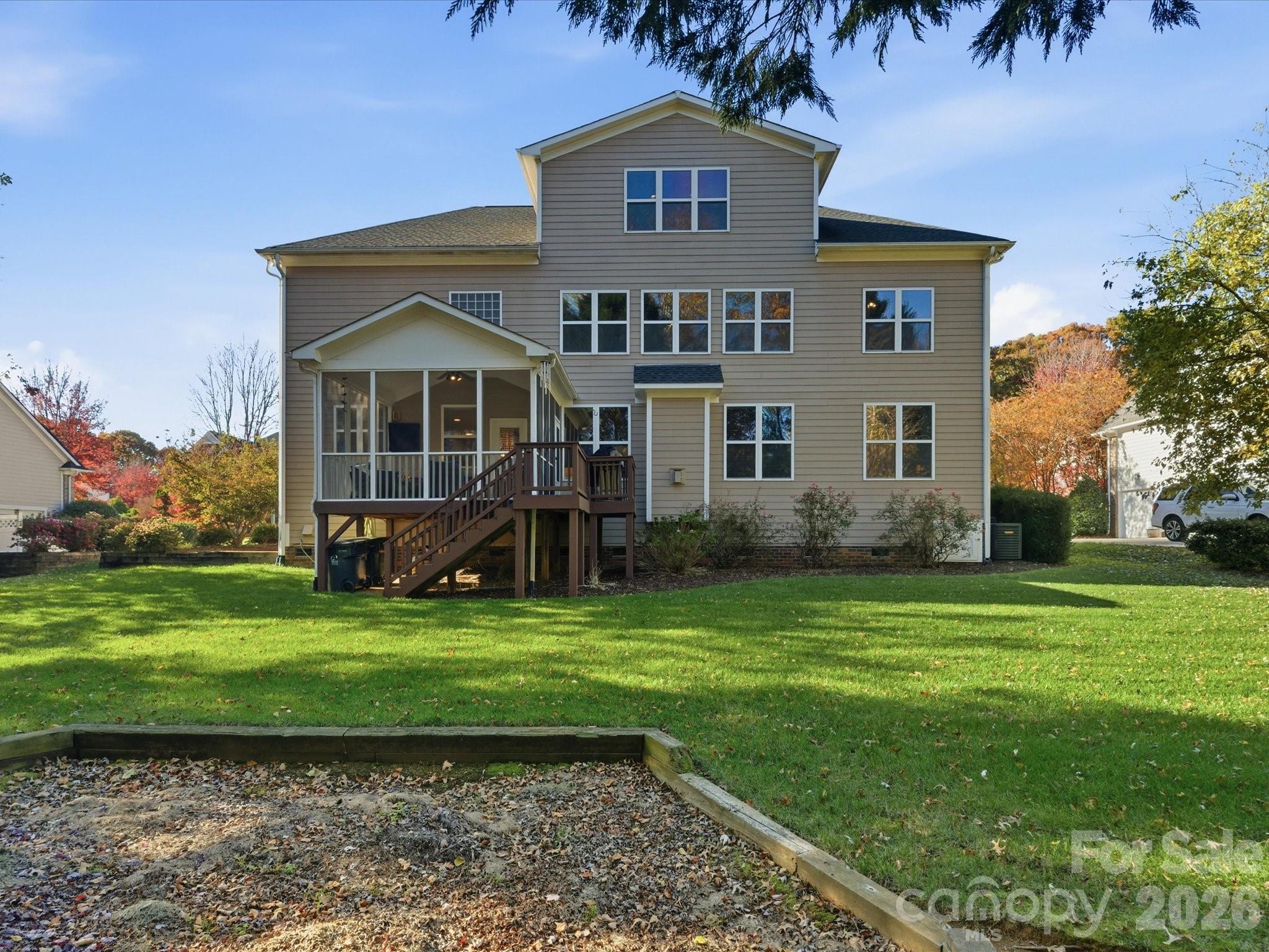6318 Riverside Oaks Drive Huntersville, NC 28078 - Photo 48 of 48 a front view of a house with a yard