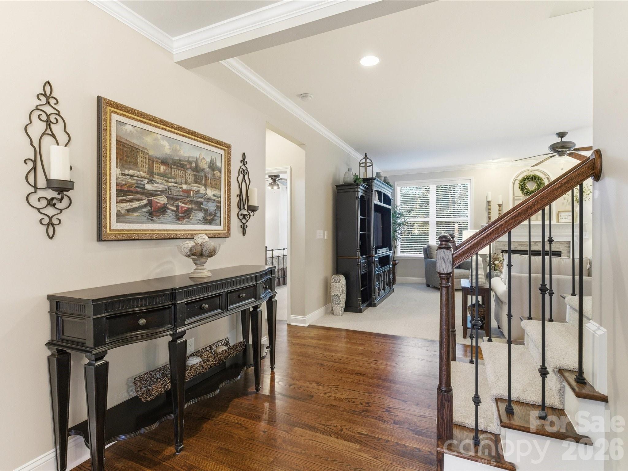 6318 Riverside Oaks Drive Huntersville, NC 28078 - Photo 9 of 48 a view of entryway with wooden floor and stairs