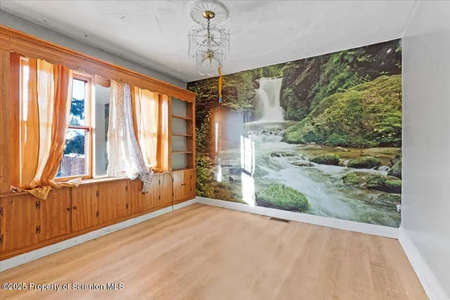 a workspace with furniture and window