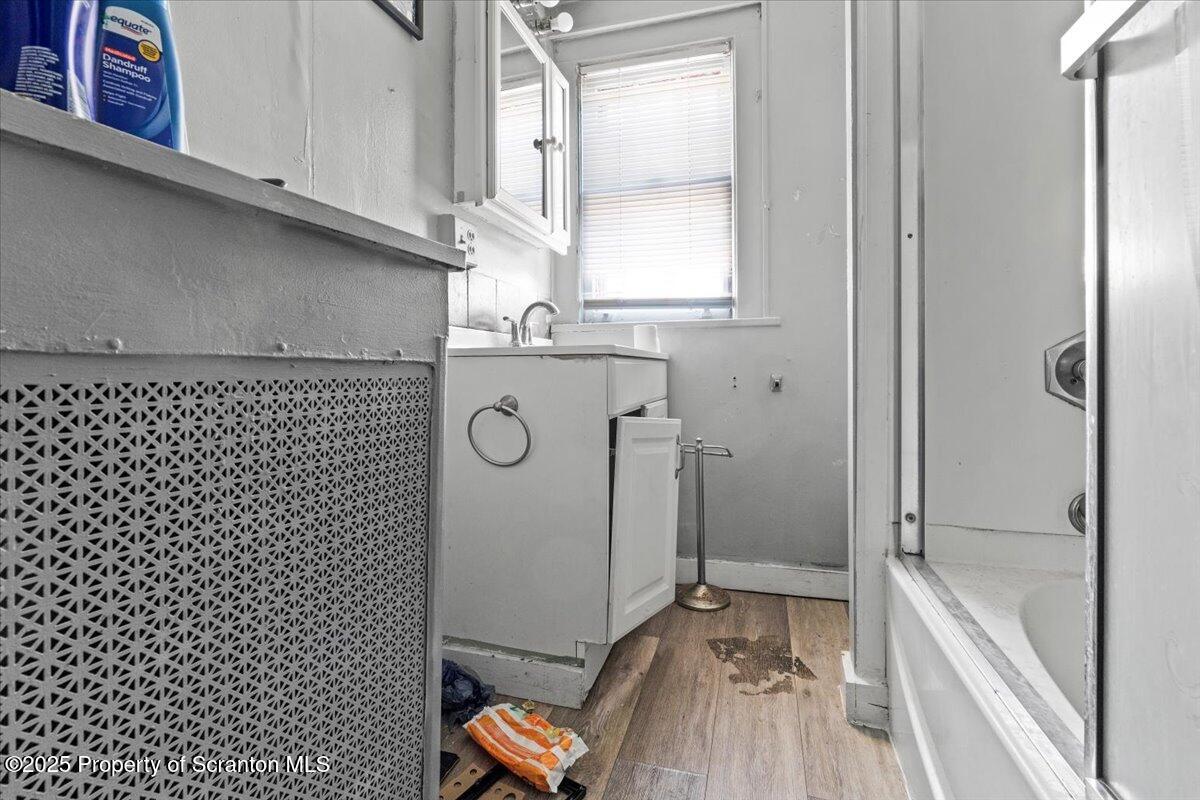 705 Landis Street Scranton, PA 18504 - Photo 20 of 35 a bathroom with a sink and a shower