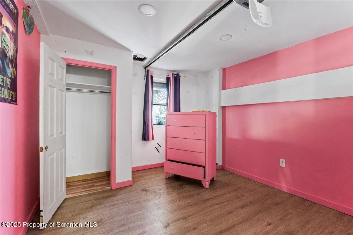 705 Landis Street Scranton, PA 18504 - Photo 22 of 35 wooden floor and windows in a room