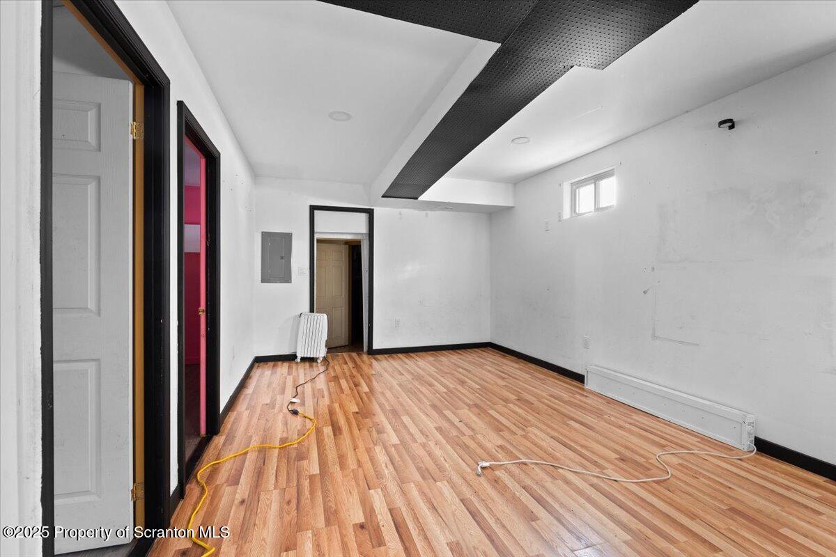 705 Landis Street Scranton, PA 18504 - Photo 27 of 35 a view of a hallway with wooden floor