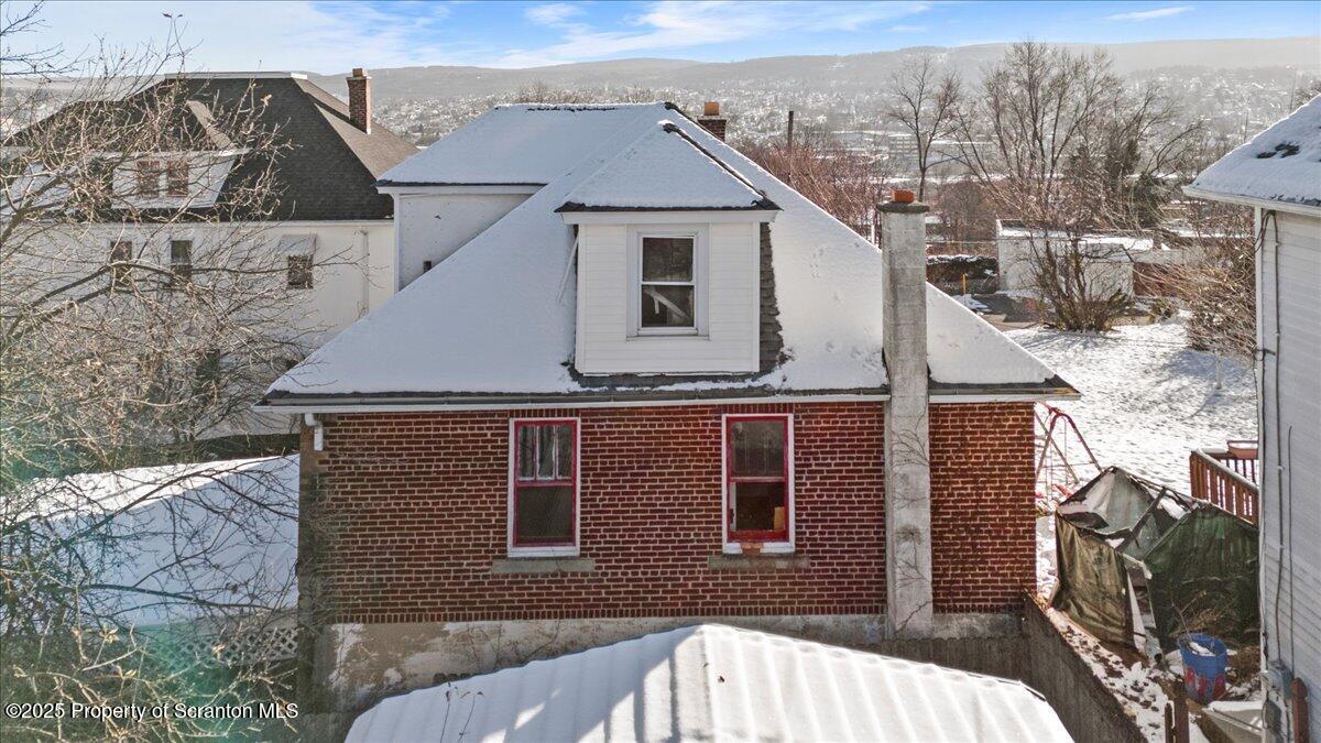705 Landis Street Scranton, PA 18504 - Photo 6 of 35 a view of a house with a balcony