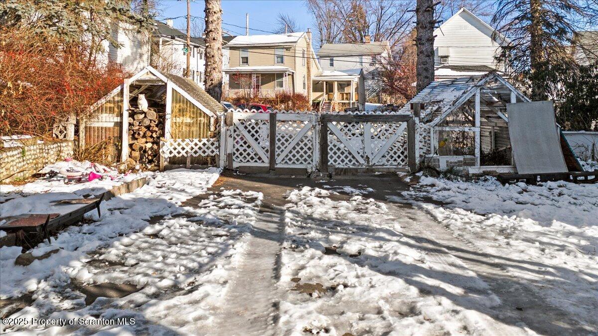 705 Landis Street Scranton, PA 18504 - Photo 8 of 35 a front view of a house with a yard
