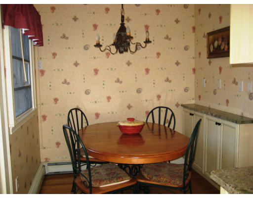 33 Manor House Road Newton, MA 02459 - Photo 15 of 27 a view of a dining room with furniture and wooden floor