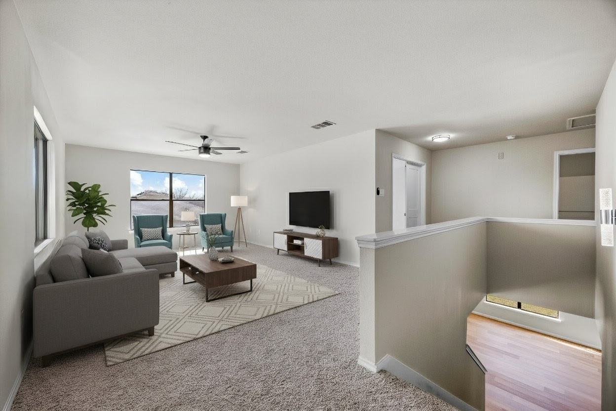 7541 Redrick Drive Austin, TX 78747 - Photo 6 of 40 Living area with carpet floors and a ceiling fan