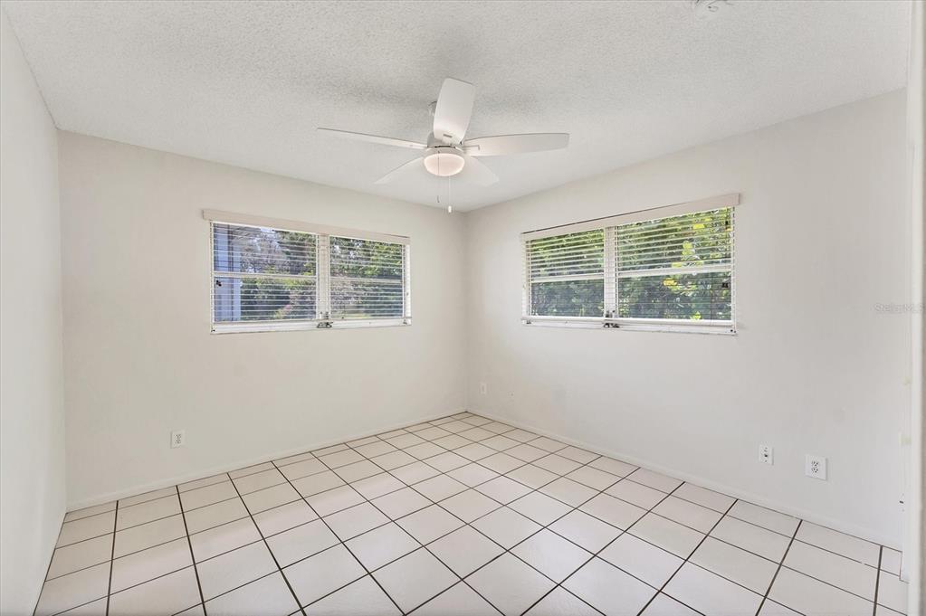 534 Sutton Place Longboat Key, FL 34228 - Photo 17 of 47 a view of an empty room and window