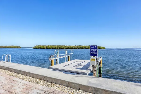 a view of a lake with a swimming pool